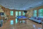 Gameroom offers a pool table, foosball table, chalk board wall, bunk bed and a flat screen TV